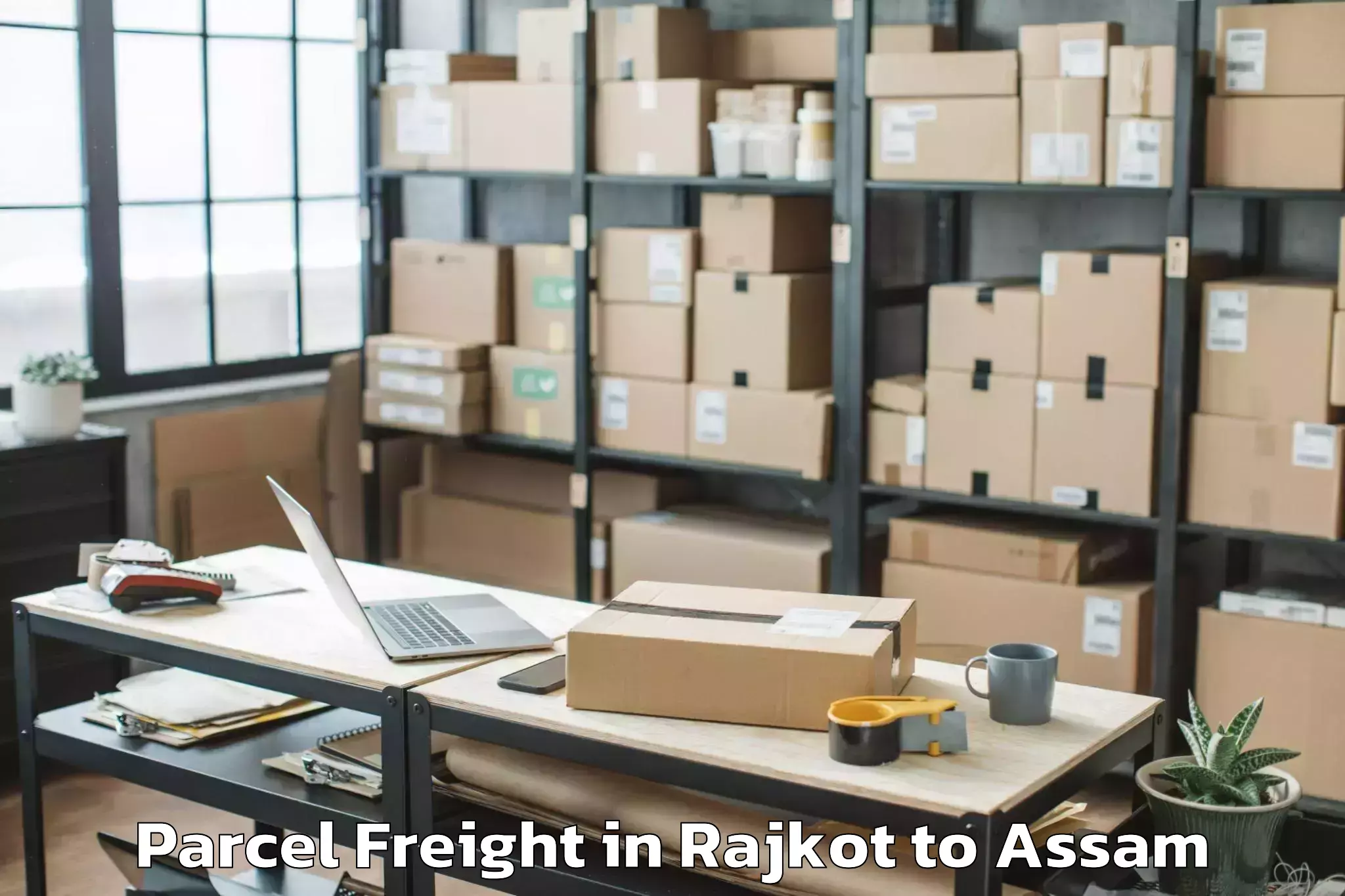 Reliable Rajkot to Guwahati University Parcel Freight